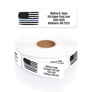 A rectangular personalized address label displayed above a large roll of matching labels, featuring a patriotic, distressed black and blue flag.