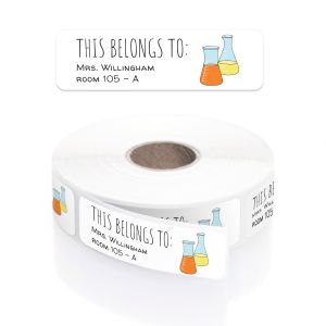 A roll of personalized classroom name labels with a science beaker design, in a clear plastic dispenser with a close-up graphic overlay