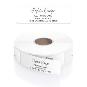 A paper roll of White Mixed Script address labels showcasing an elegant cursive name font beside a clean three-line block text layout.