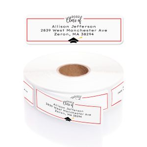 A roll of personalized graduation address labels with a red border line and black graduation cap graphic displayed across the side.