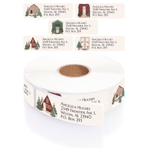 Five personalized Assorted Winter Houses address labels displaying cozy winter home illustrations above a roll of address labels.