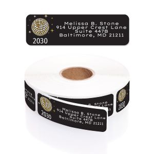 Personalized New Year's disco ball address label preview shown above a roll of black self-adhesive labels featuring sparkling stars and year.