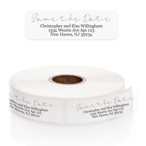 Clear Save The Date address label displayed above a roll of custom return address stickers featuring elegant script and block fonts.