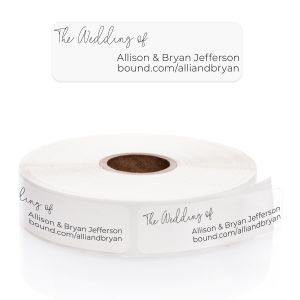 A clear paper roll of wedding address labels featuring a trendy 