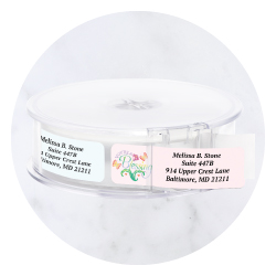 Spring-themed rolled address label with colorful Easter eggs and pastel floral patterns from Current Labels.
