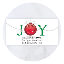 Festive Christmas sheeted address labels by Current Labels with holiday greenery and winter ornament designs.