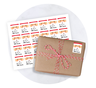 An array of personalized holiday gift tag stickers showcasing Santa's face along with a spot to personalize with the senders name.