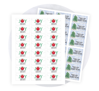 A flat sheet of Christmas address labels displaying vibrant holiday illustrations including a festive winter tree and joyful ornaments.