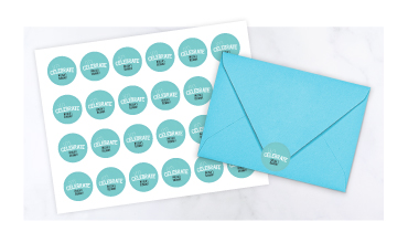 Round personalized envelope seals in festive holiday and classic everyday patterns.