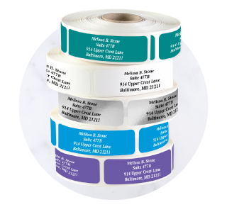 Standard Rolled Address Labels in various colors and fonts on a white dispenser roll.